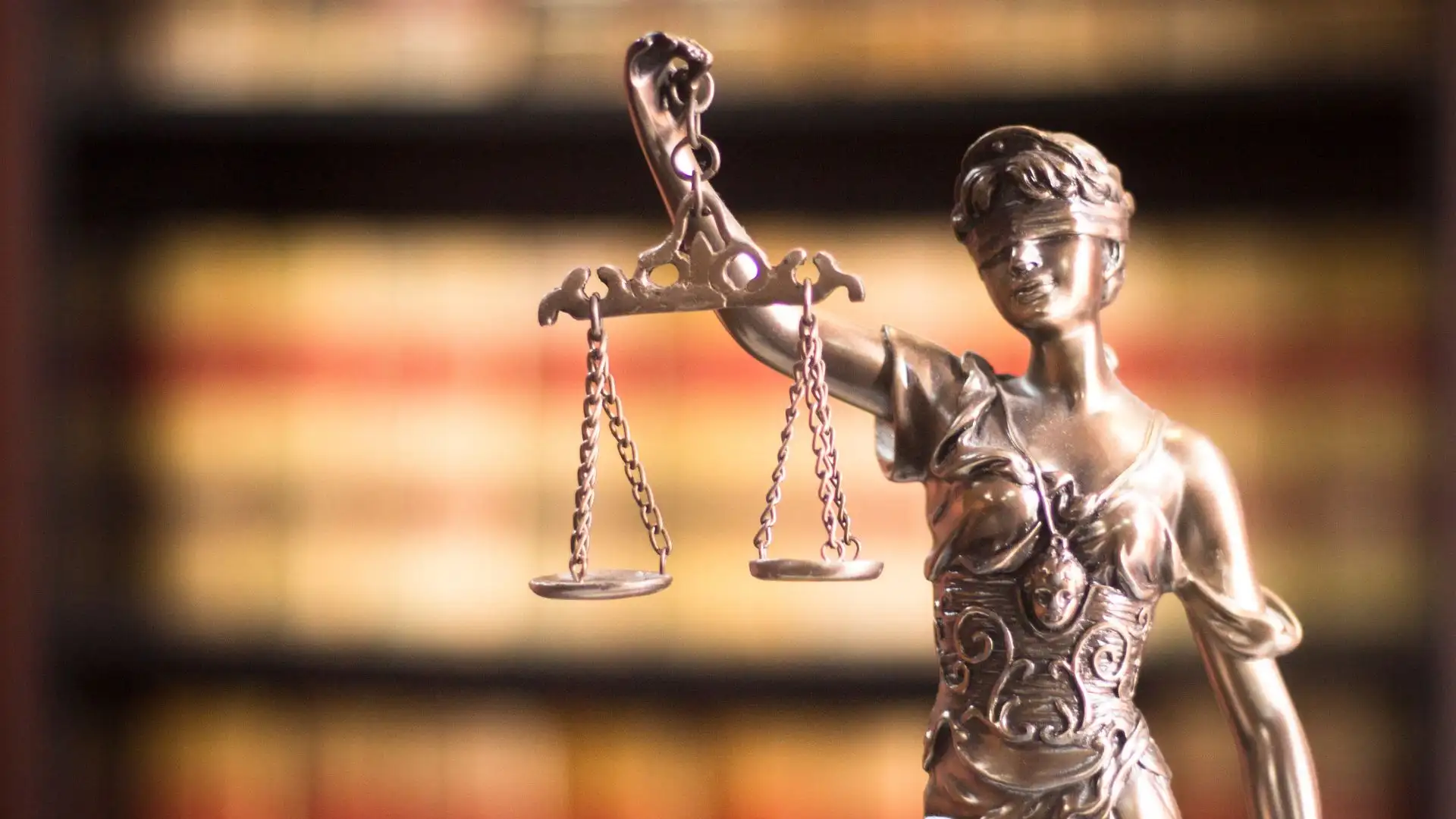 Lady Justice statue with scales, law concept.