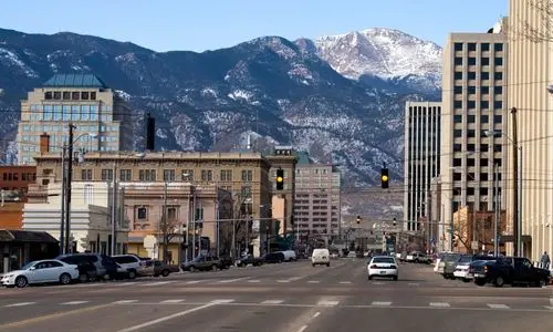 colorado springs marketing agency Downtown street with mountain backdrop.