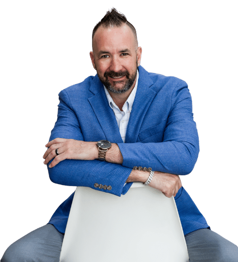 Man in blue blazer sitting